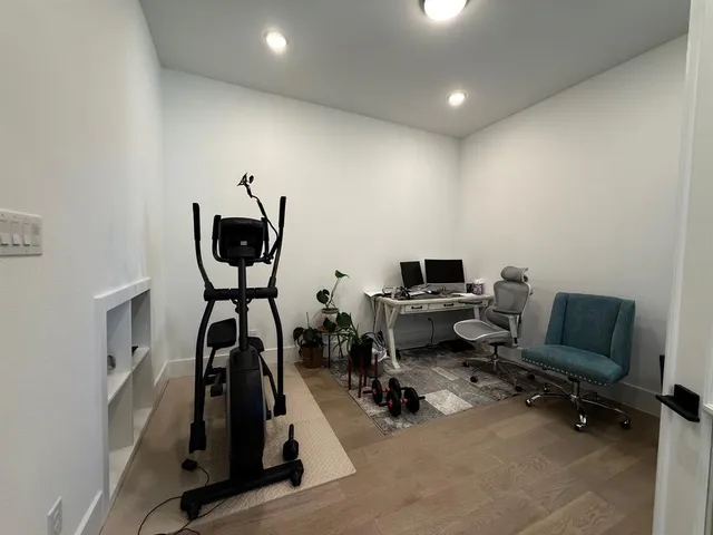 a view of a room with gym equipment