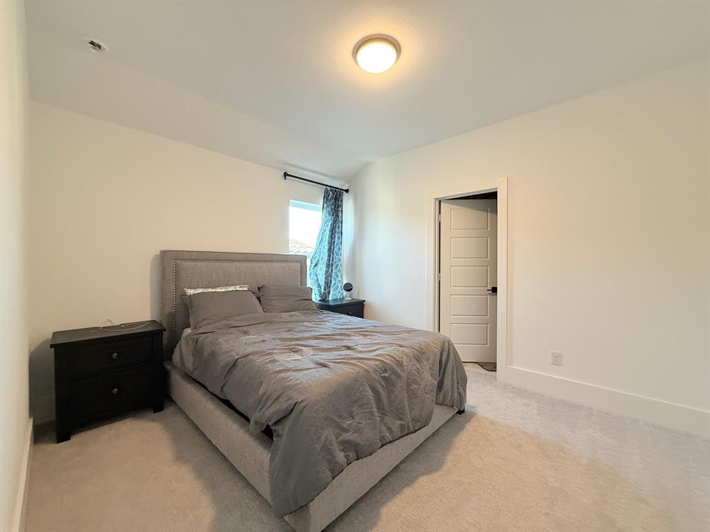 12314 Compassplant Drive Frisco, TX 75035 - Photo 32 of 40 a bedroom with a bed and a closet