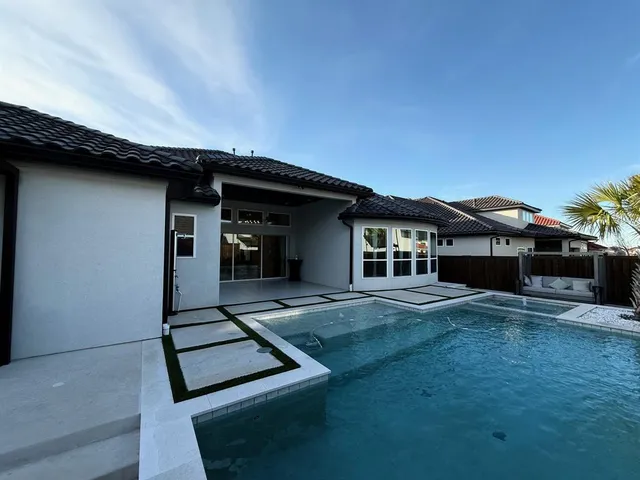 a front view of a house with yard