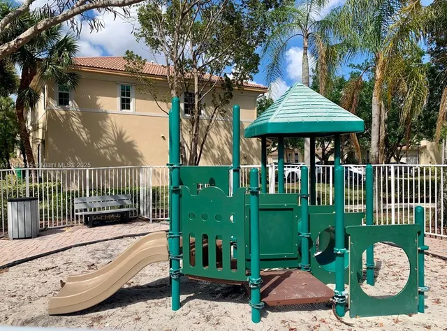 a view of a house with a garden