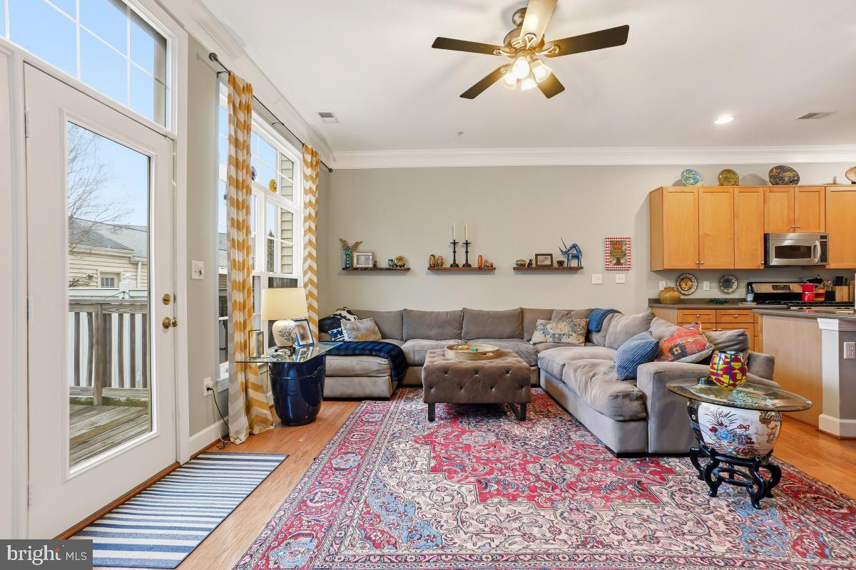 23416 Clarksridge Road Clarksburg, MD 20871 - Photo 18 of 48 a living room with furniture and a window