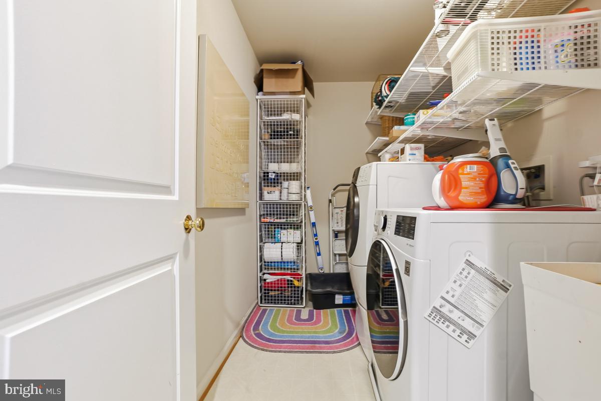 23416 Clarksridge Road Clarksburg, MD 20871 - Photo 21 of 48 a utility room with dryer and washer