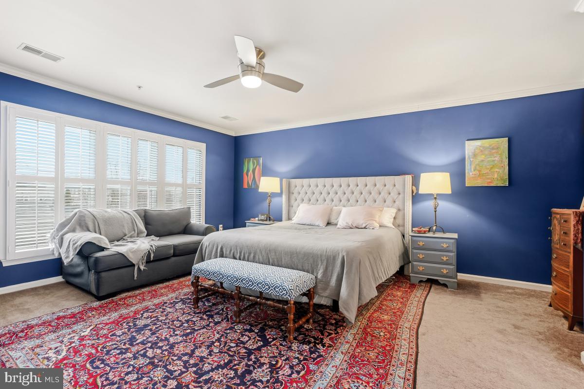 23416 Clarksridge Road Clarksburg, MD 20871 - Photo 22 of 48 a bedroom with furniture and a large window