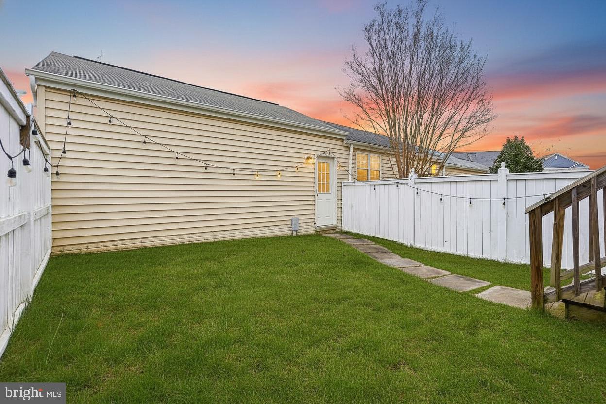 23416 Clarksridge Road Clarksburg, MD 20871 - Photo 41 of 48 a view of a backyard with a garden