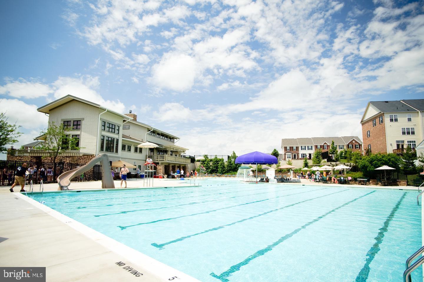 23416 Clarksridge Road Clarksburg, MD 20871 - Photo 44 of 48 a view of a tennis ground with large trees