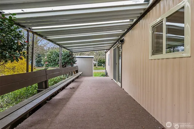 a view of porch with a potted plant