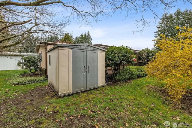 a backyard of a house with lots of green space
