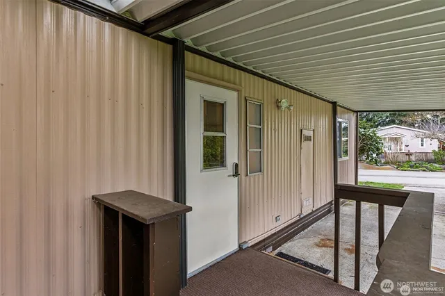 a view of a porch with furniture