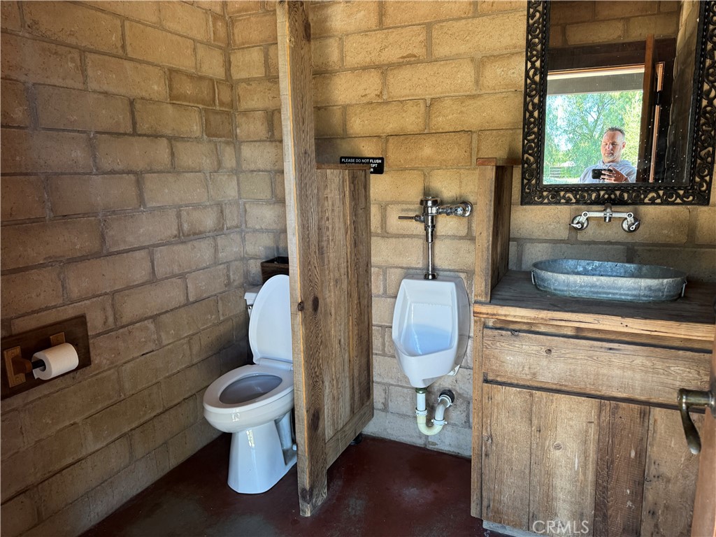38831 Pauba Road Temecula, CA 92592 - Photo 19 of 30 a bathroom with a toilet and a sink