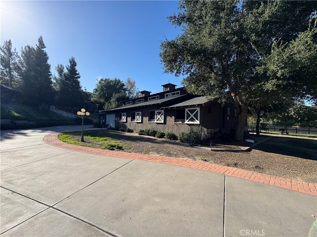 38831 Pauba Road Temecula, CA 92592 - Photo 28 of 30 a view of swimming pool with trees in the background