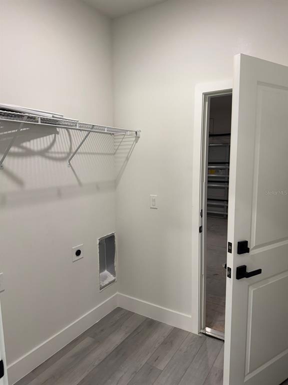 13385 Southwest 32nd Court Ocala, FL 34473 - Photo 5 of 20 a view of a room with rack on the wall