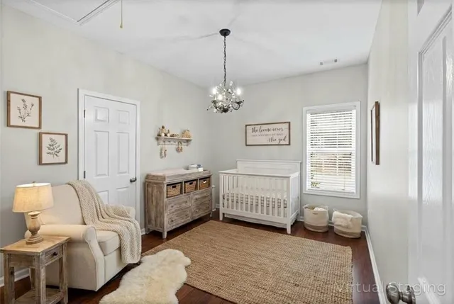 a view of a room with workspace and windows