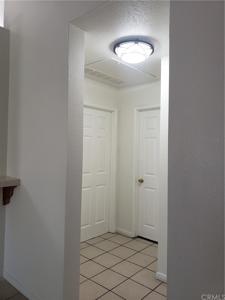 7221 Petrol Street, Unit 6 Paramount, CA 90723 - Photo 11 of 21 a view of a room with a mirror