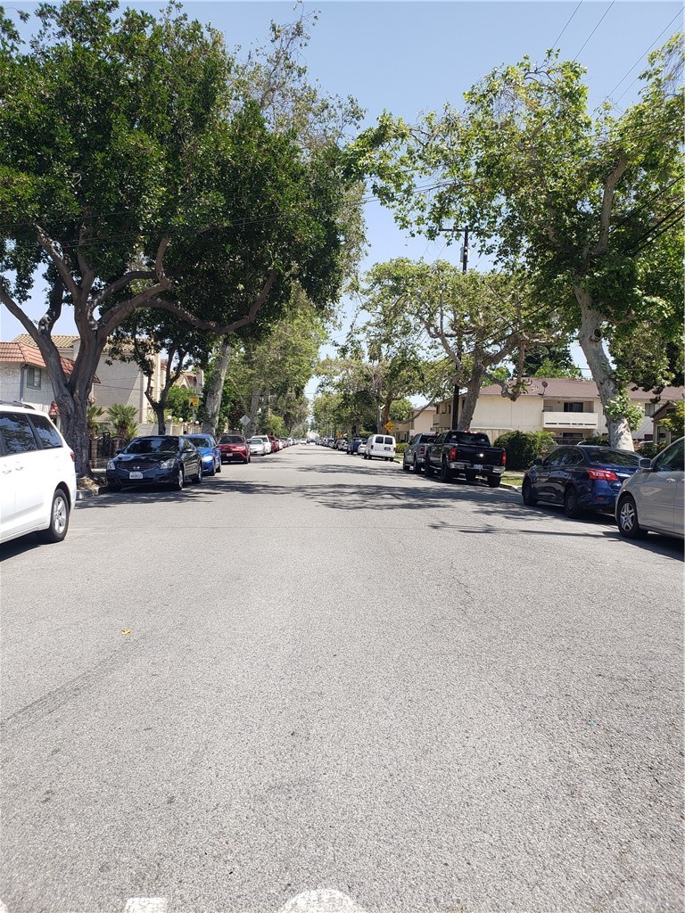 7221 Petrol Street, Unit 6 Paramount, CA 90723 - Photo 4 of 21 a view of road with cars