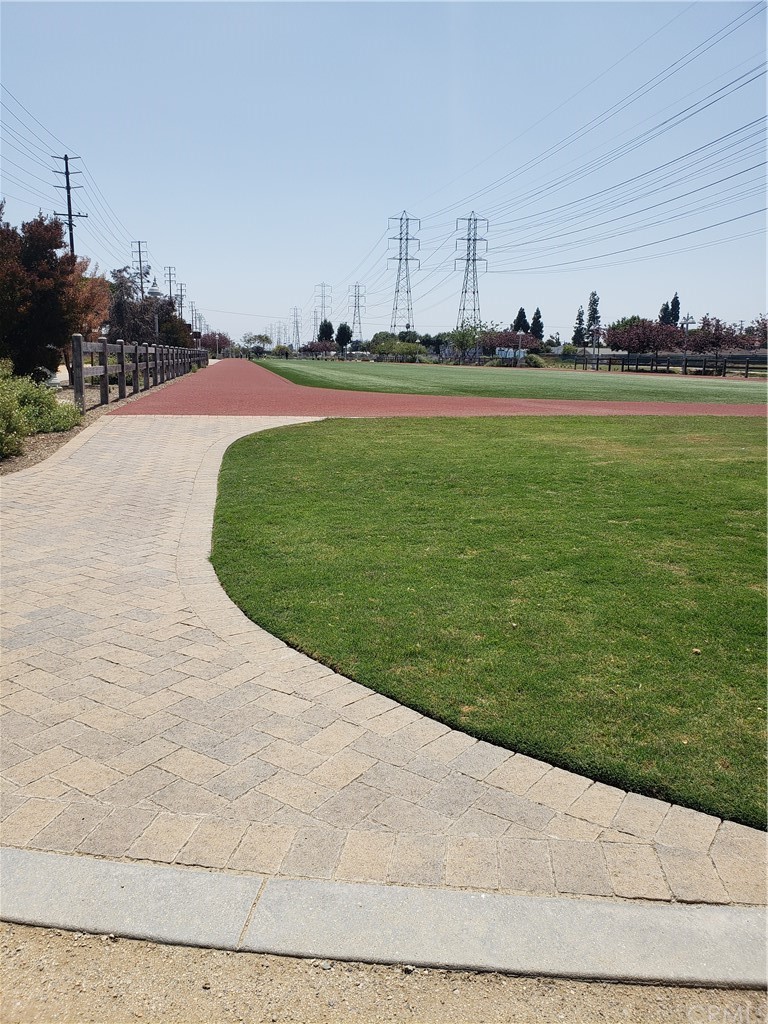 7221 Petrol Street, Unit 6 Paramount, CA 90723 - Photo 6 of 21 a view of a swimming pool and an outdoor space