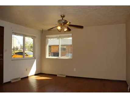 a view of an empty room and window