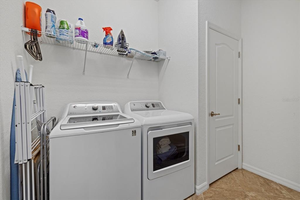 17018 Blue Rdg Place Bradenton, FL 34211 - Photo 24 of 34 a utility room with dryer and washer