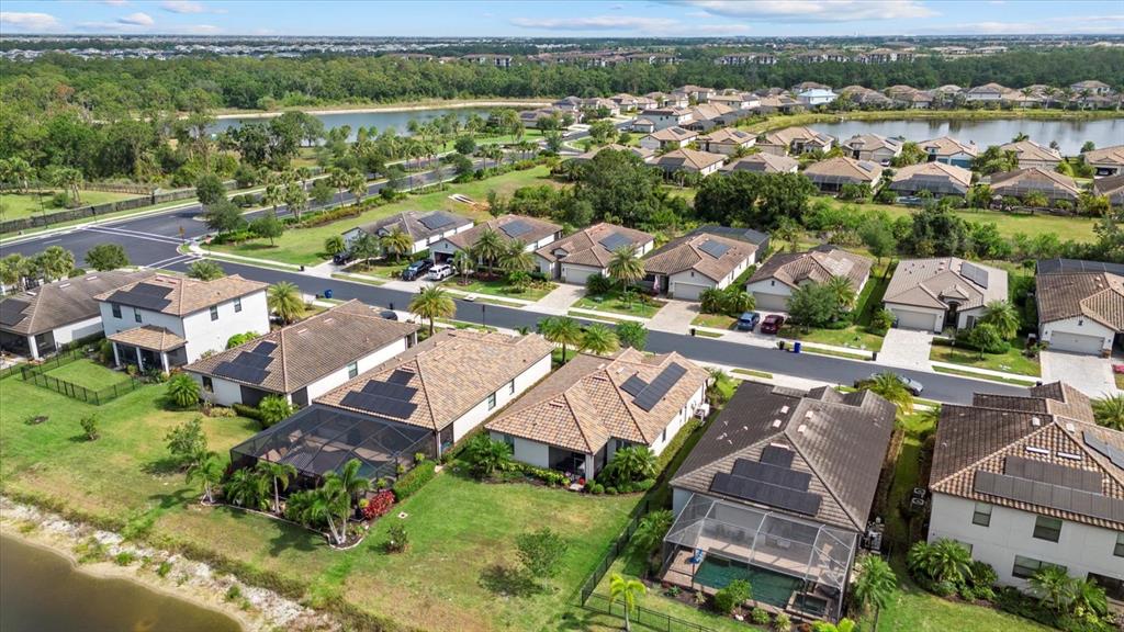 17018 Blue Rdg Place Bradenton, FL 34211 - Photo 29 of 34 an aerial view of residential houses with outdoor space and river