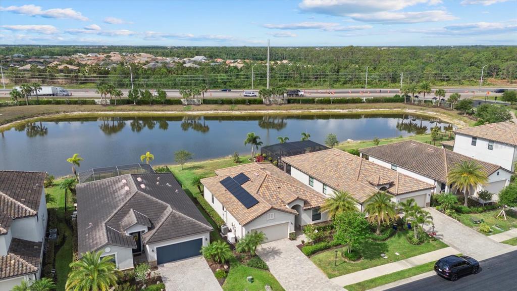 17018 Blue Rdg Place Bradenton, FL 34211 - Photo 31 of 34 an aerial view of a house with pool patio and outdoor seating