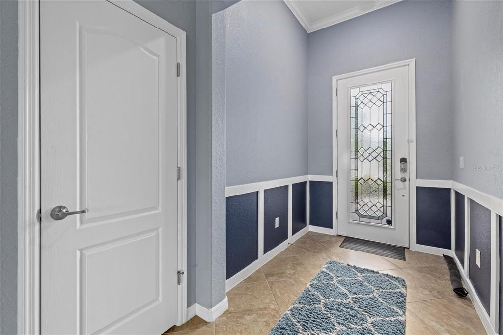 17018 Blue Rdg Place Bradenton, FL 34211 - Photo 4 of 34 a view of an entryway with livingroom