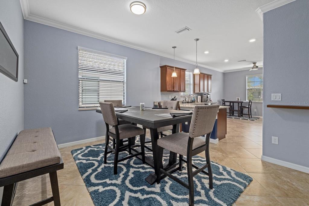 17018 Blue Rdg Place Bradenton, FL 34211 - Photo 9 of 34 a view of a dining room with furniture