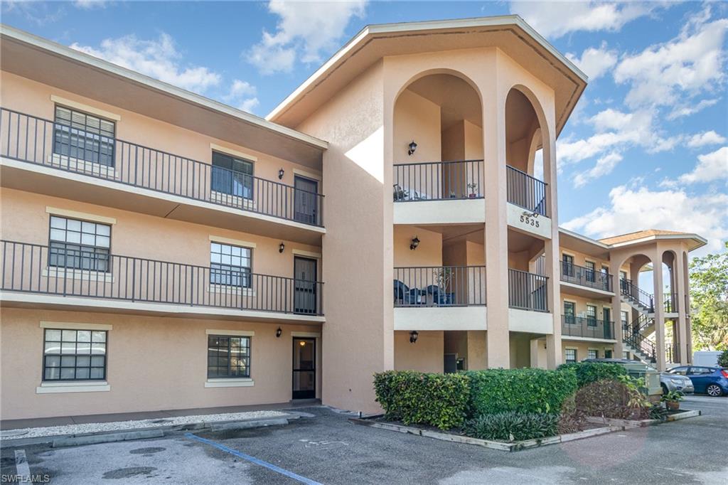 5535 Rattlesnake Hammock Road, Unit 103 Naples, FL 34113 - Photo 25 of 25 View of building exterior