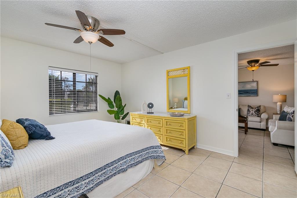 5535 Rattlesnake Hammock Road, Unit 103 Naples, FL 34113 - Photo 10 of 25 View of Primary Bedroom from Primary Bathroom