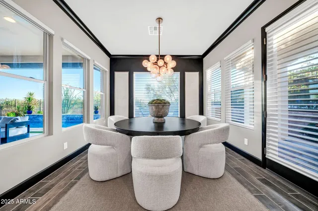 a kitchen with stainless steel appliances granite countertop a sink and stove