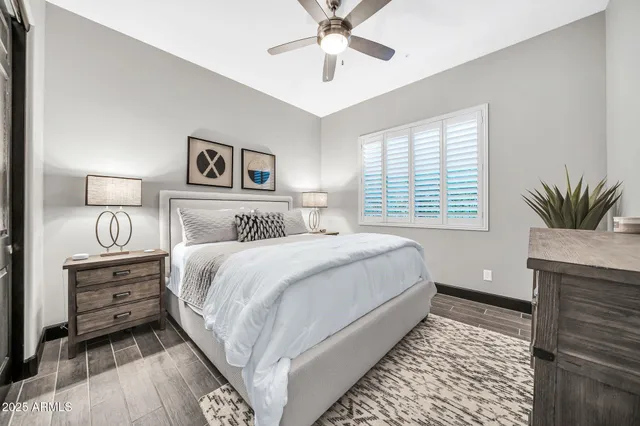 a bathroom with a shower sink and mirror