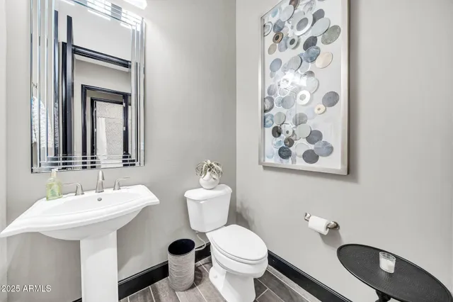 a bedroom with a bed and a book shelf