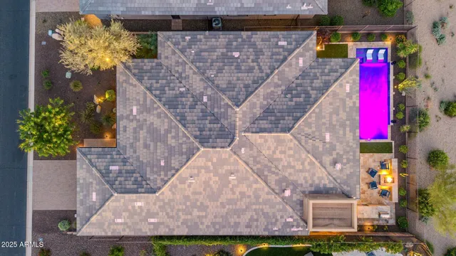 a aerial view of a house with a yard