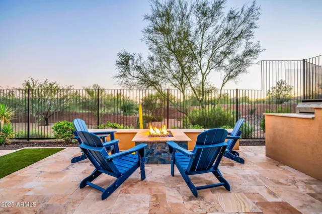 a view of house with swimming pool outdoor seating