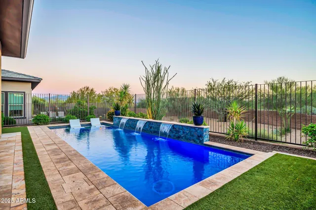a view of balcony with two potted plants