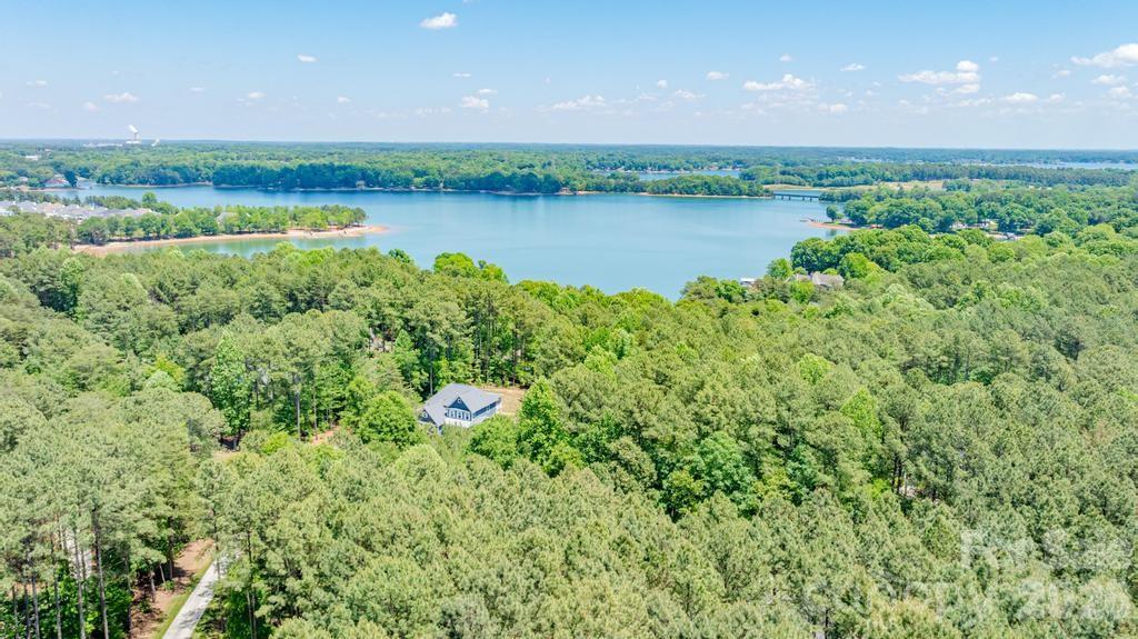 7315 Bay Ridge Drive Denver, NC 28037 - Photo 7 of 39 a view of a garden with a lake