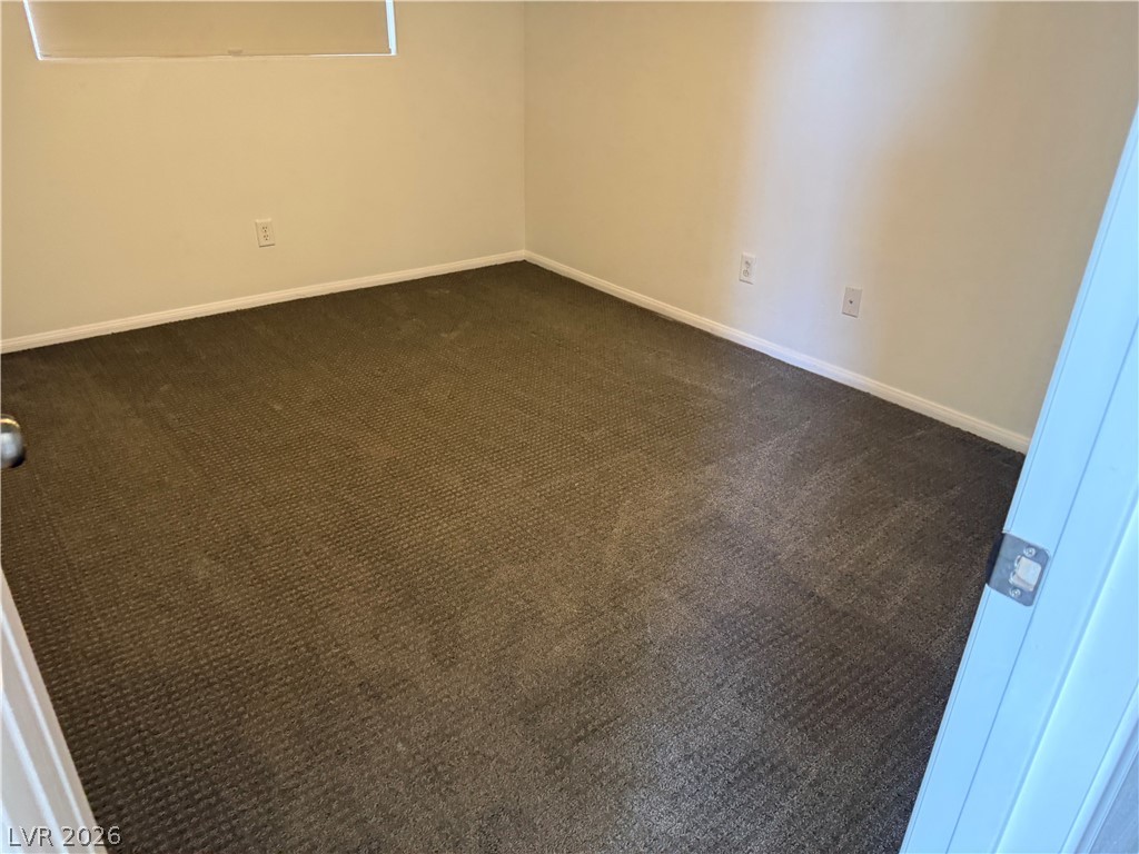 1141 Cathedral Ridge Street Henderson, NV 89052 - Photo 40 of 77 This cozy room offers a blank canvas for personalization.