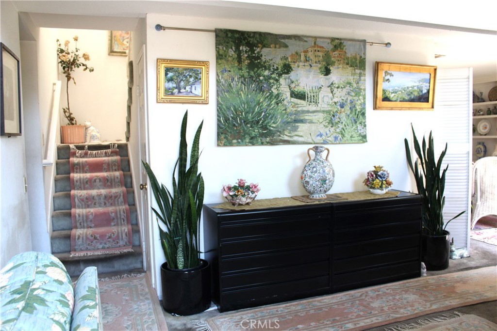 21 Wellesley, Unit 24 Irvine, CA 92612 - Photo 16 of 31 a view of a living room with a potted plant