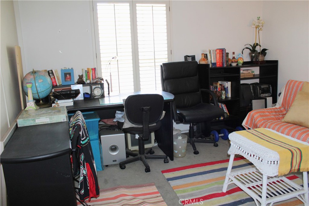 21 Wellesley, Unit 24 Irvine, CA 92612 - Photo 20 of 31 a work room with furniture and a window