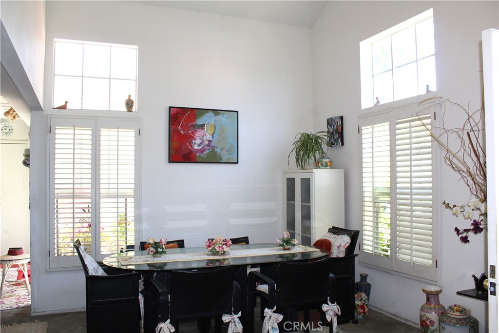 21 Wellesley, Unit 24 Irvine, CA 92612 - Photo 6 of 31 a room with a large window