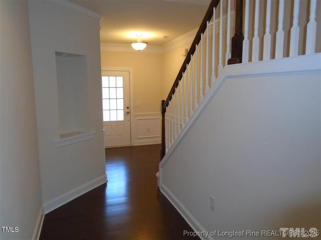 234 Daymire Glen Lane Cary, NC 27519 - Photo 2 of 8 a view of entryway with wooden floor