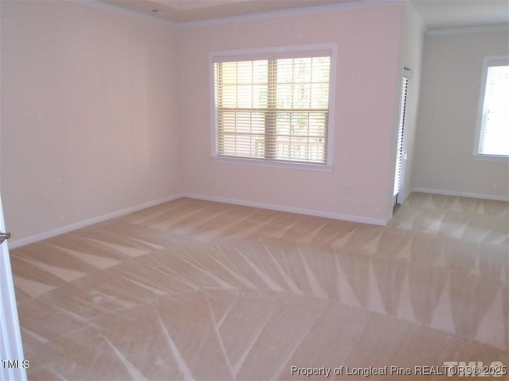 234 Daymire Glen Lane Cary, NC 27519 - Photo 6 of 8 an empty room with windows