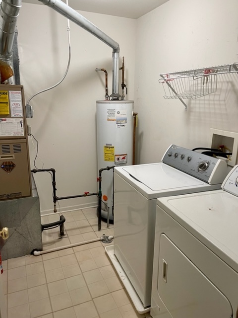 2459 Oneida Lane Naperville, IL 60563 - Photo 11 of 14 a utility room with dryer and washer