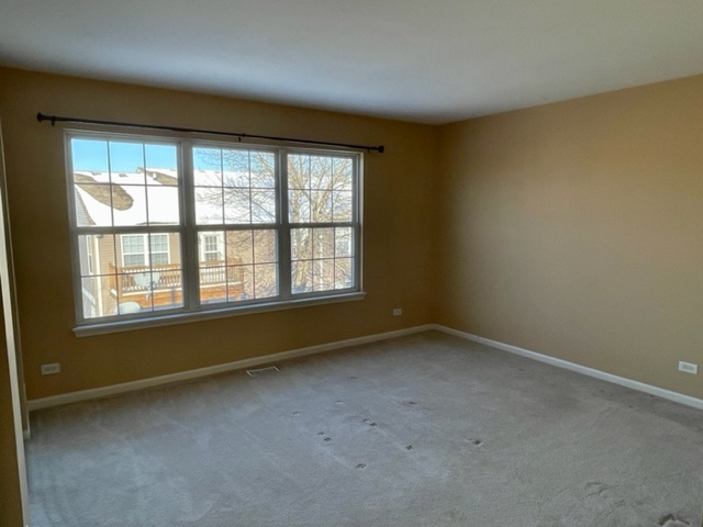 2459 Oneida Lane Naperville, IL 60563 - Photo 7 of 14 an empty room with a window