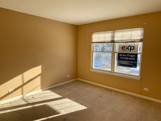 2459 Oneida Lane Naperville, IL 60563 - Photo 8 of 14 a view of a livingroom with a window