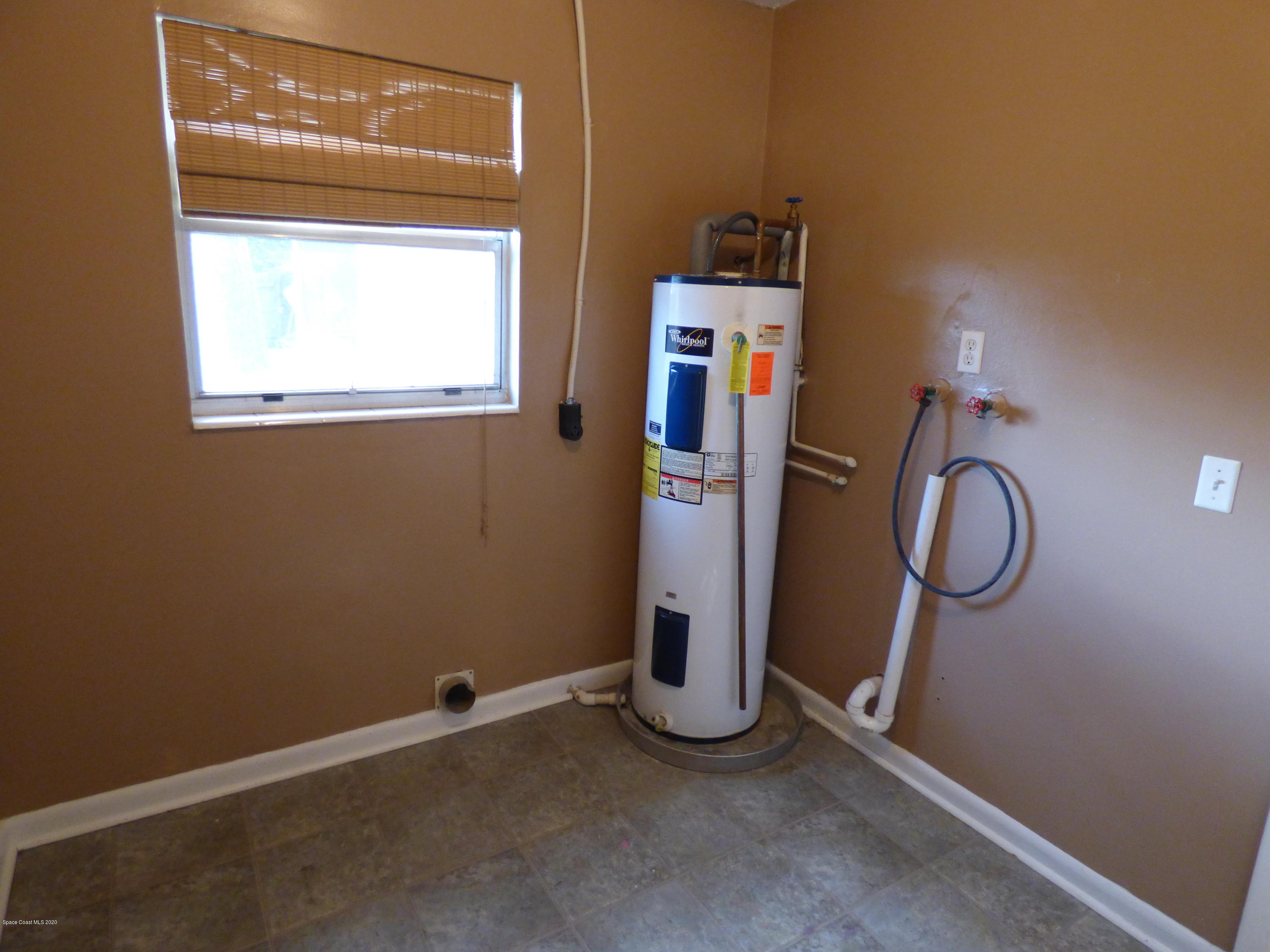 2802 Cherbourg Road Cocoa, FL 32926 - Photo 14 of 24 Laundry Room