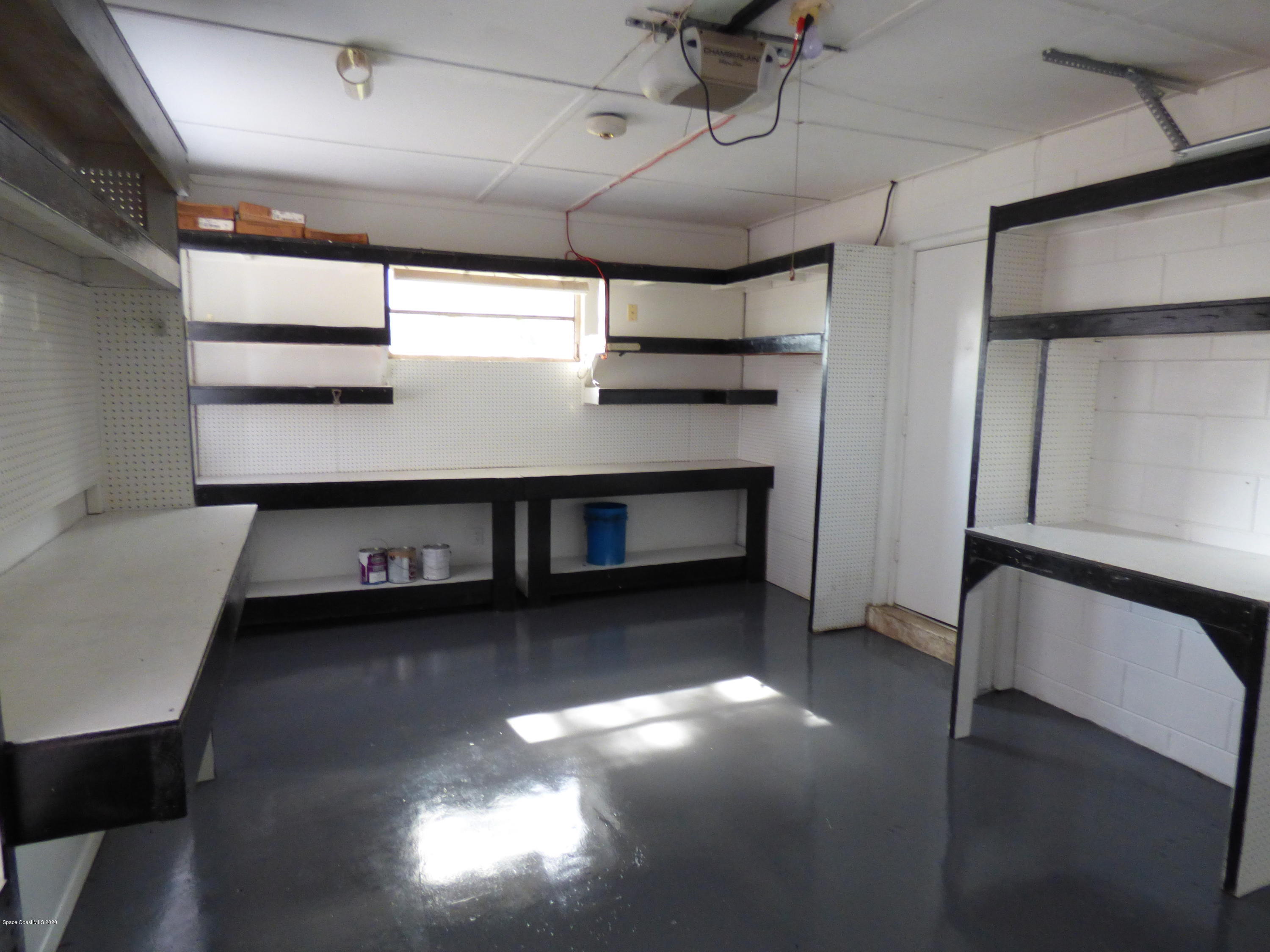 2802 Cherbourg Road Cocoa, FL 32926 - Photo 15 of 24 Huge One and Half Car Garage