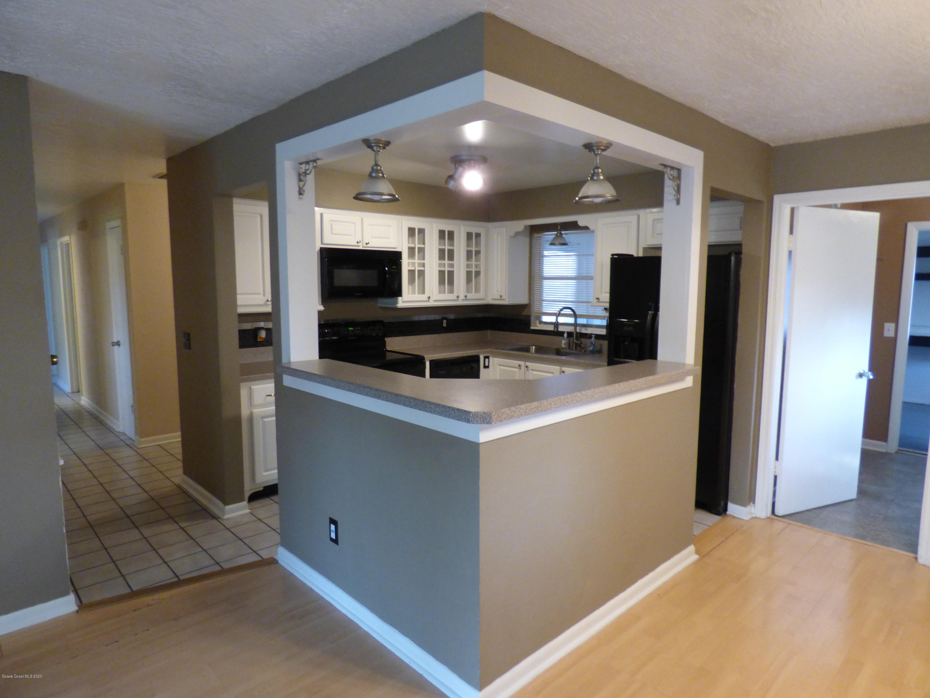 2802 Cherbourg Road Cocoa, FL 32926 - Photo 4 of 24 Open Kitchen