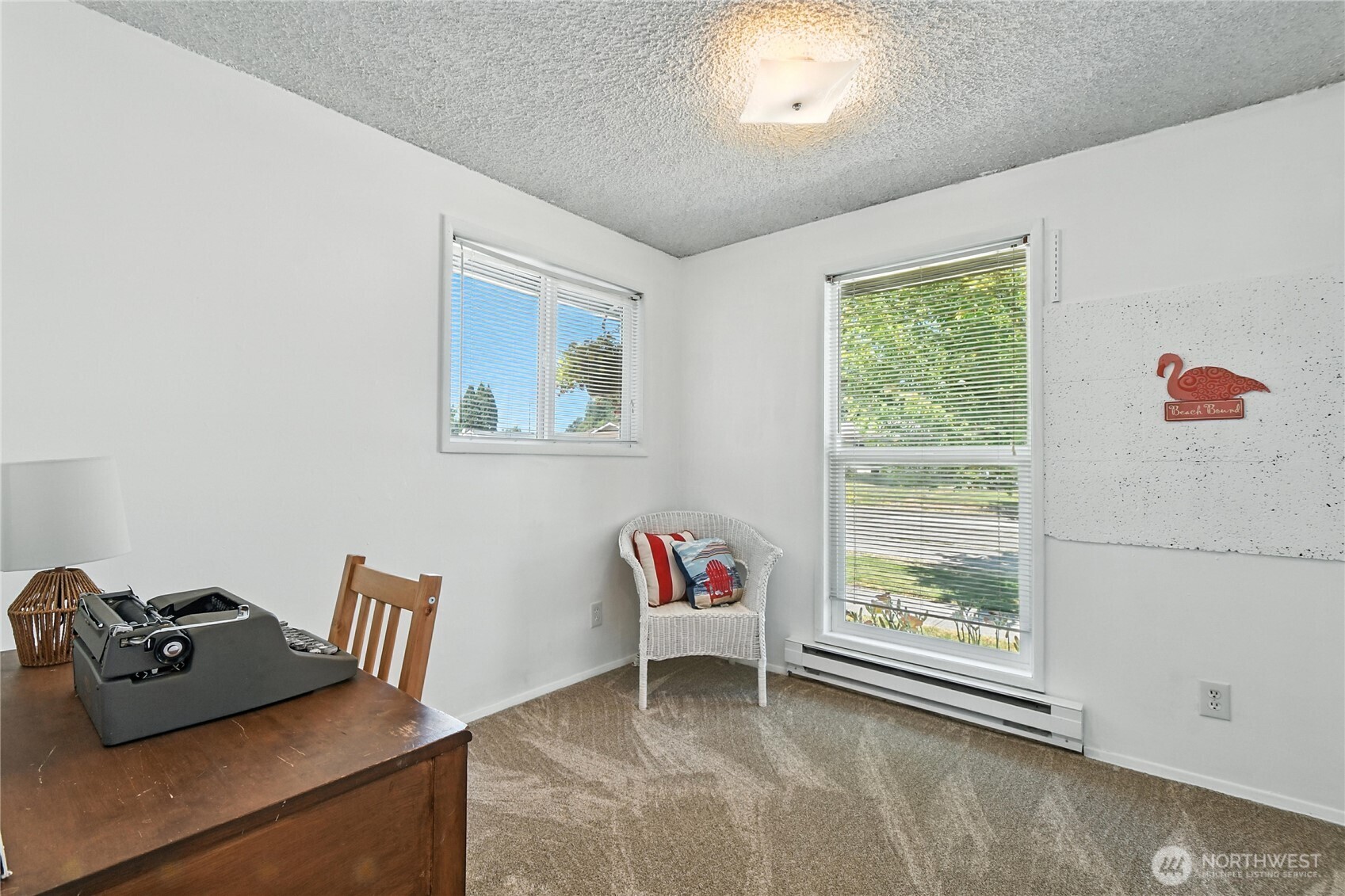 2102 35th Avenue Longview, WA 98632 - Photo 22 of 31 a living room with furniture and a window