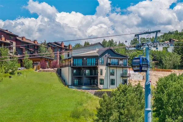 a view of houses with outdoor space and deck