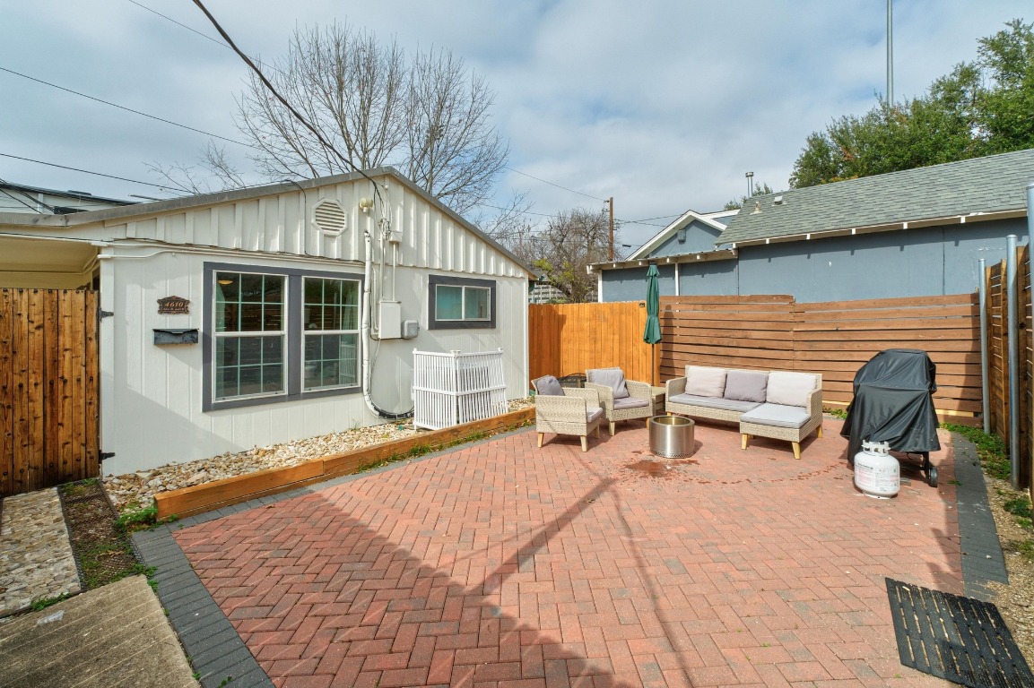 4610 Avenue B, Unit B Austin, TX 78751 - Photo 15 of 22 Fenced backyard featuring outdoor lounge area and a patio