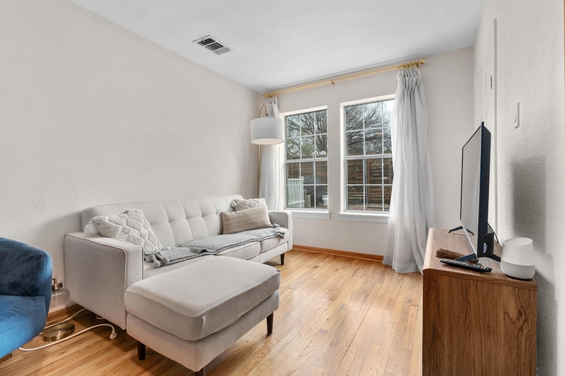 4610 Avenue B, Unit B Austin, TX 78751 - Photo 6 of 22 Living room featuring light wood-type flooring and baseboards